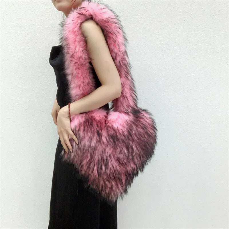 Women's heart-shaped plush crossbody bag in black with tassel and large capacity