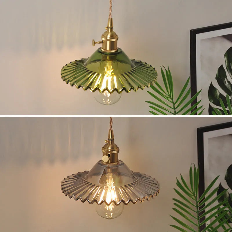 Retro brass bedside lotus wall lamp with glass shade in transparent finish, copper body, 22cm diameter