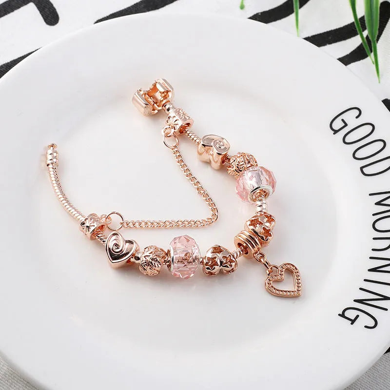 Rose gold geometric love bracelet on display with alloy plating finish