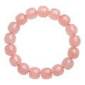 Natural crystal barrel bead bracelet with pink 8-10mm geometric beads