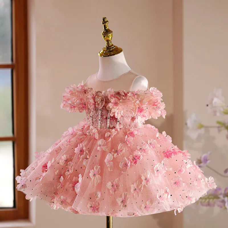 Girls pink polyester pettiskirt princess style dress on white background showing full skirt shape