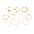 Gold tone openwork flower design alloy ring for women with glossy electroplated finish