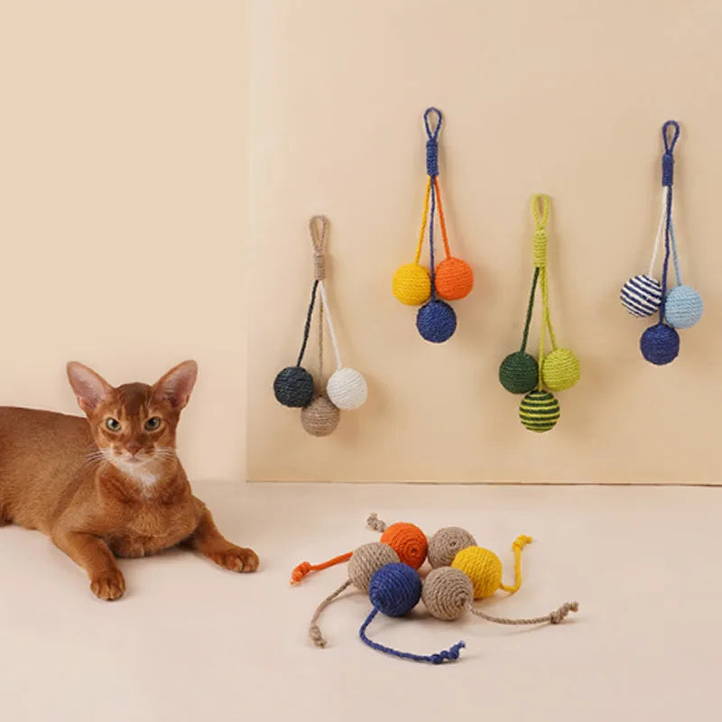 Cat toy set with teaser stick and catnip ball in blue, green, red, yellow colours
