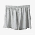 Men's solid colour cotton boxer shorts with a high waist and loose fit.