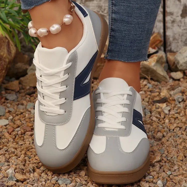 Blue women's low-top lace-up training shoes with artificial PU upper and rubber sole for hiking.