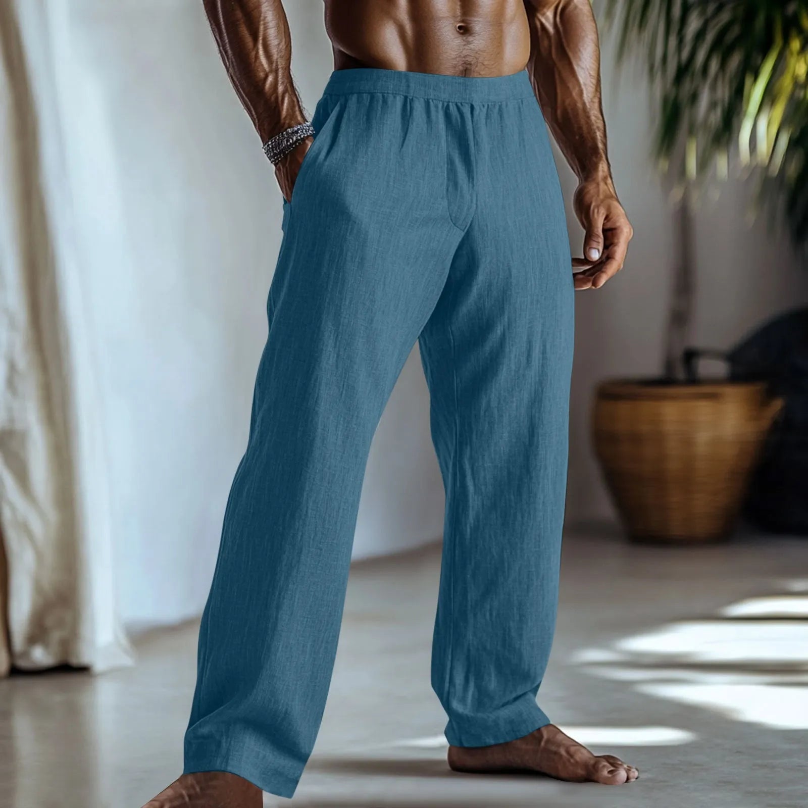 Straight-leg cotton and linen casual trousers in a light green colour, shown with visible pockets.