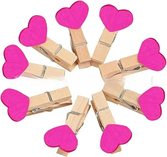 Set of five handmade solid wood heart-shaped hair clips in red, white, pink, yellow and rose.