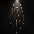 Gold or silver metal hair chain with tassel details and pearl accents for women's hairstyles