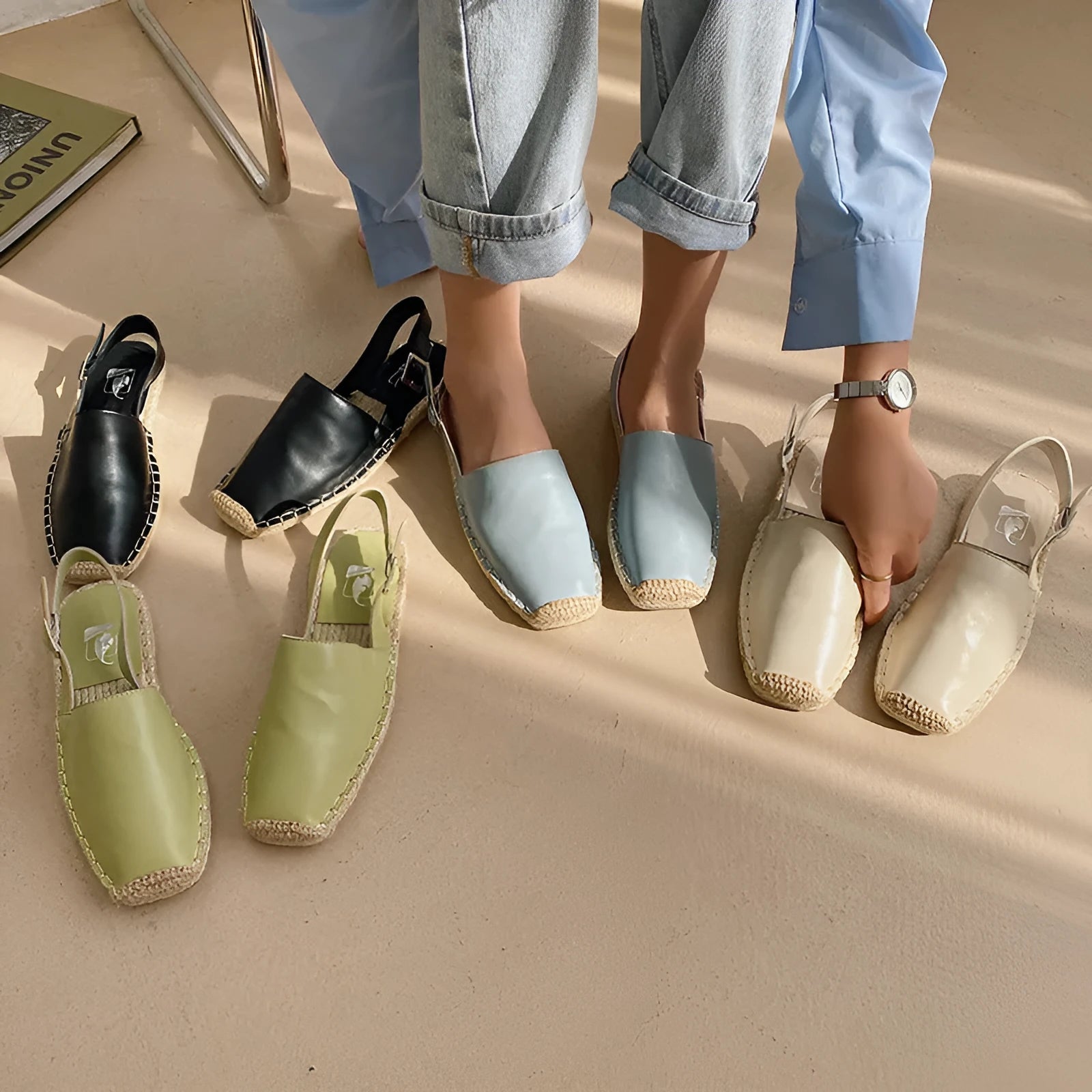 Women's beige canvas fisherman flat sandals with a soft fibre lining, shown from the side.