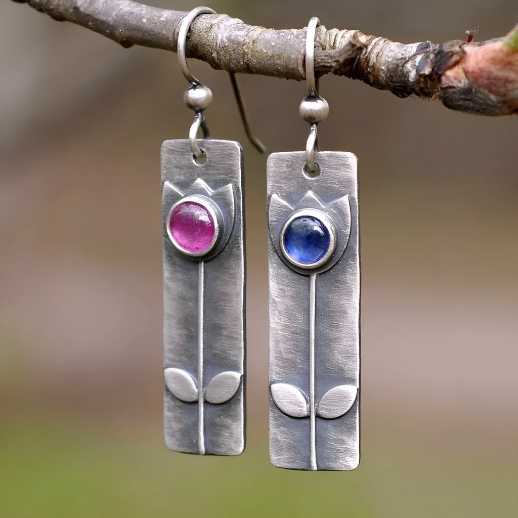 Antique finish red sapphire geometric earrings with elliptical stones and retro styling