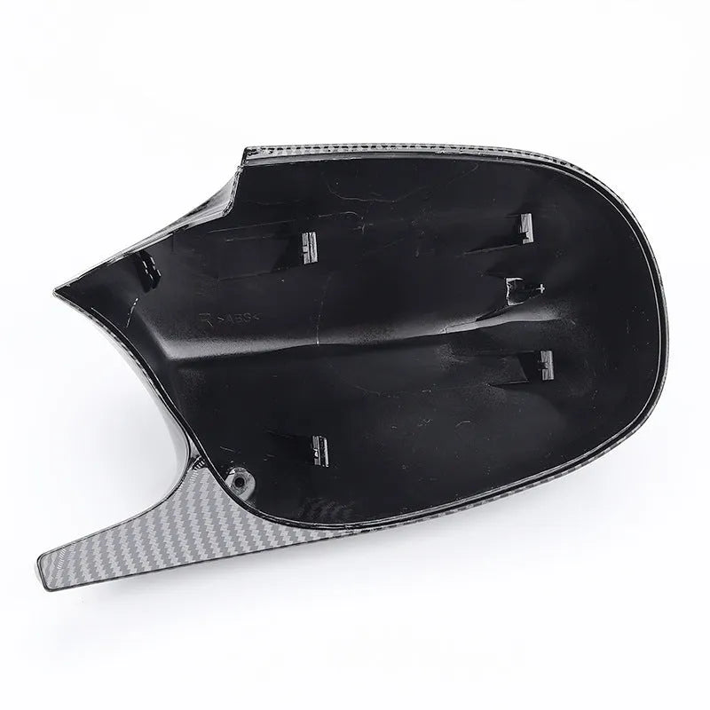 Pair of black ABS plastic rearview mirror shells for BMW 3 Series E90 door mirrors.