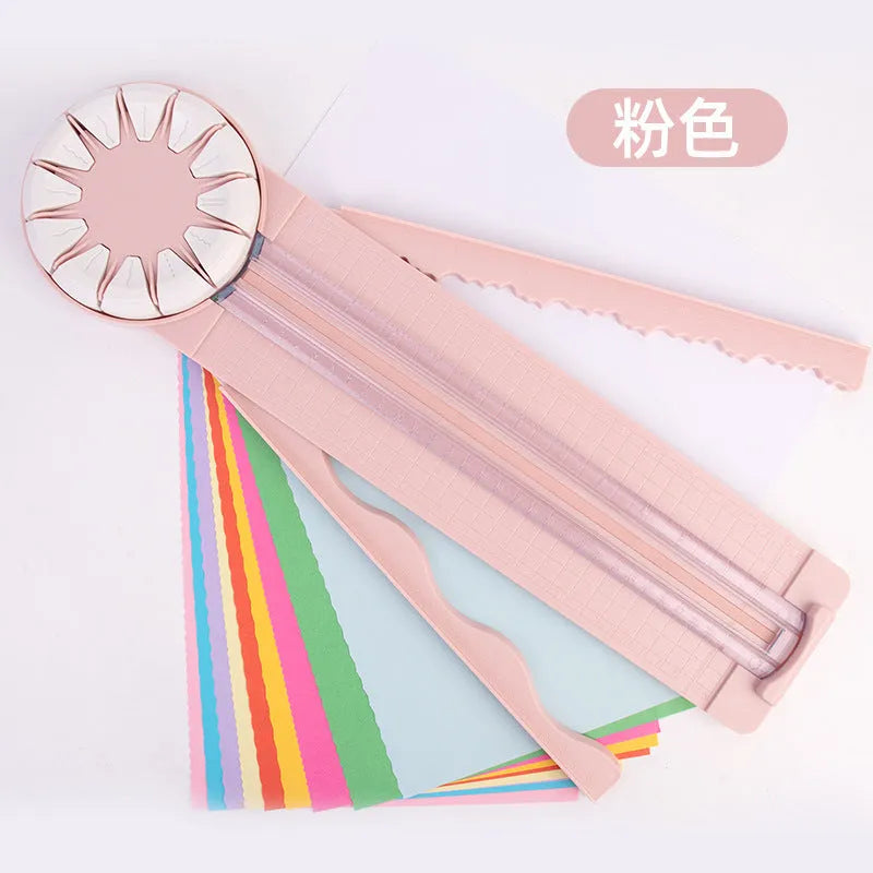 12-in-1 plastic paper cutting machine with dotted cutter measuring 46.2cm long in pink and black colour options