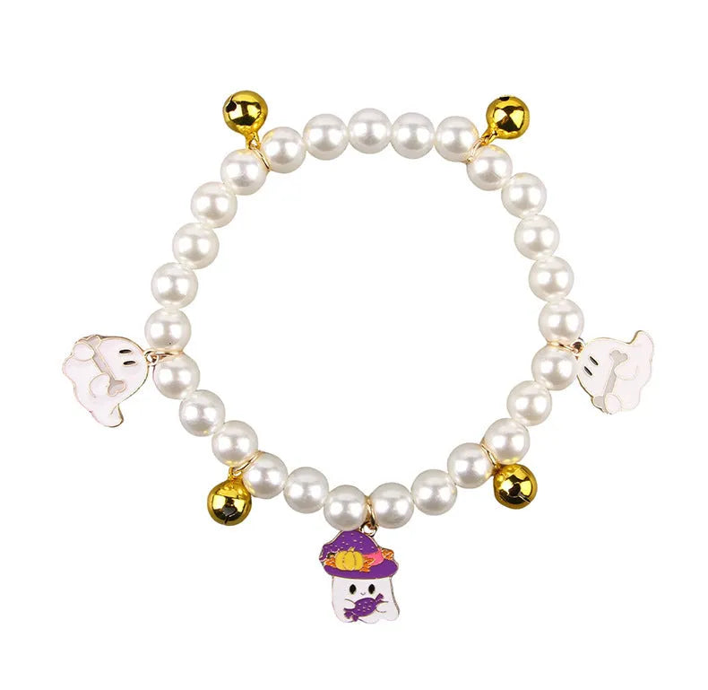 Halloween cat collar with pearl necklace decoration showing three pumpkin design variations