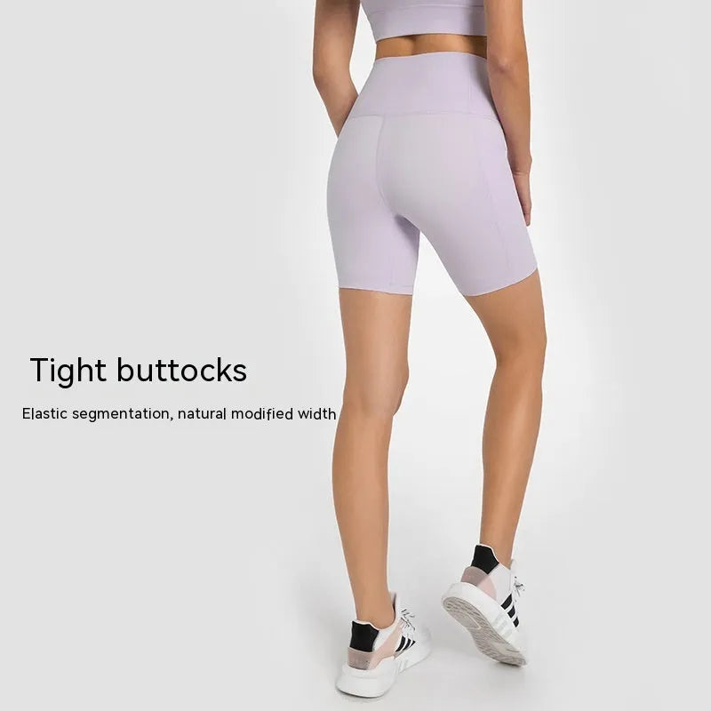 Women's short-length sports shorts in cotton blend fabric shown in black, for running and fitness activities.