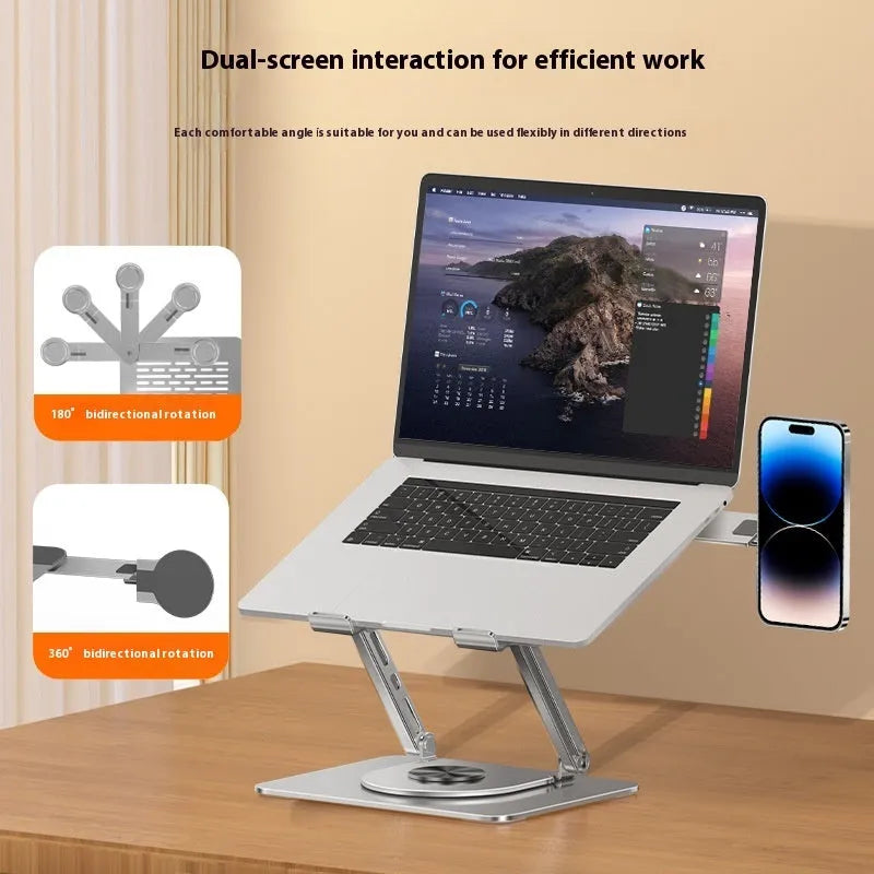 Silver carbon steel laptop stand with 360-degree rotation and a side-mounted magnetic mobile phone holder.