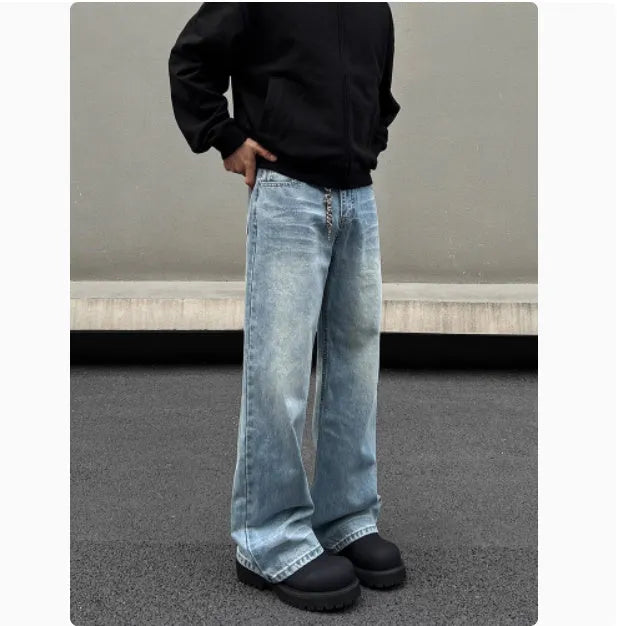 Men's blue straight jeans with whisker wash details and flared leg style