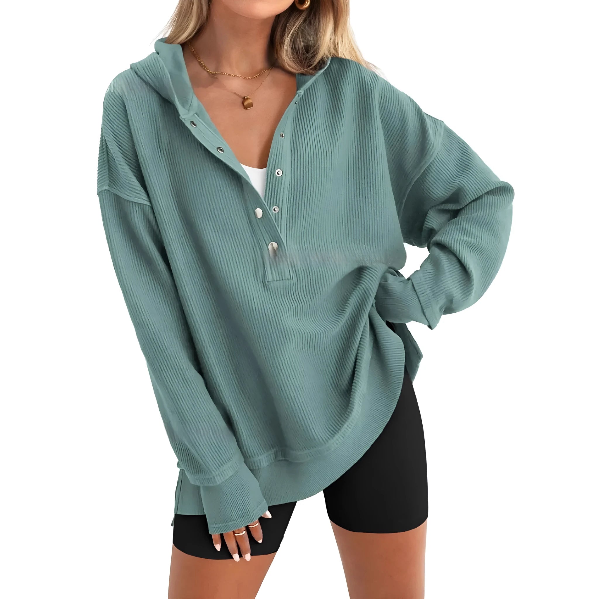 Women's loose peach coloured raglan sleeve casual pullover sweater on a hanger.