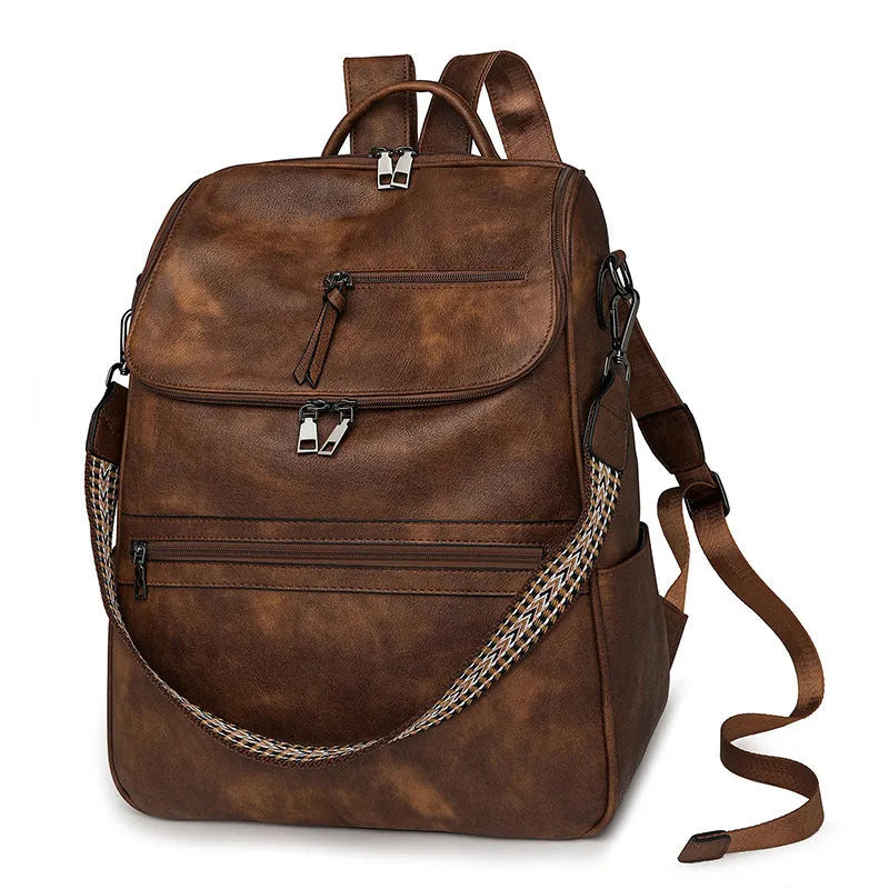 Retro PU leather unisex backpack with curved shoulder straps in solid colour options