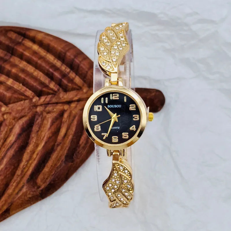 Stainless steel women's watch with round dial and vachette clasp in gold surface colour