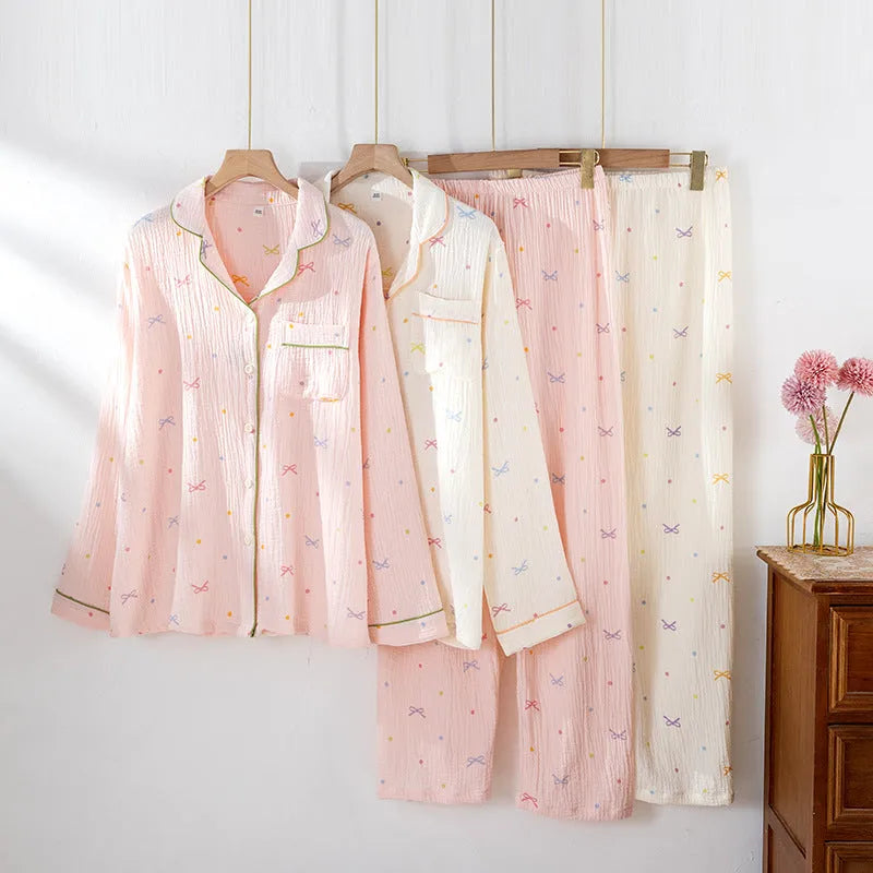 Women's pink cotton crepe pajama suit with long sleeves and matching trousers