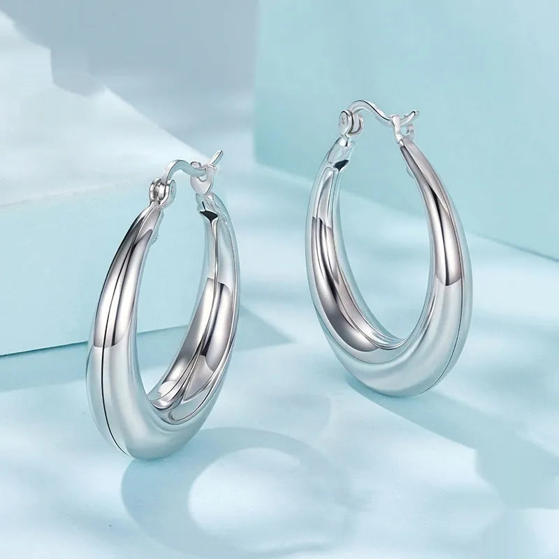 Geometric ring design ear clip earrings in copper alloy with silver needle fastening