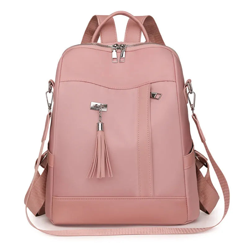 Soft black PU backpack with large main compartment and front organisational pockets