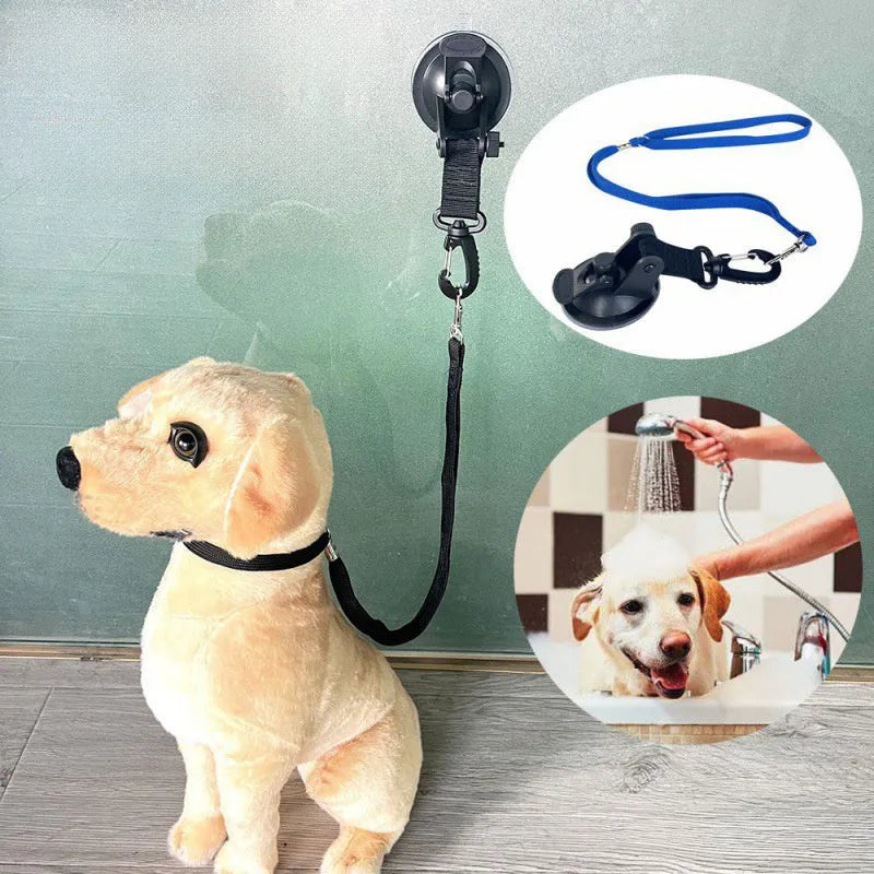 Finished pet bathing restraint with suction cups and traction rope on a blue background.