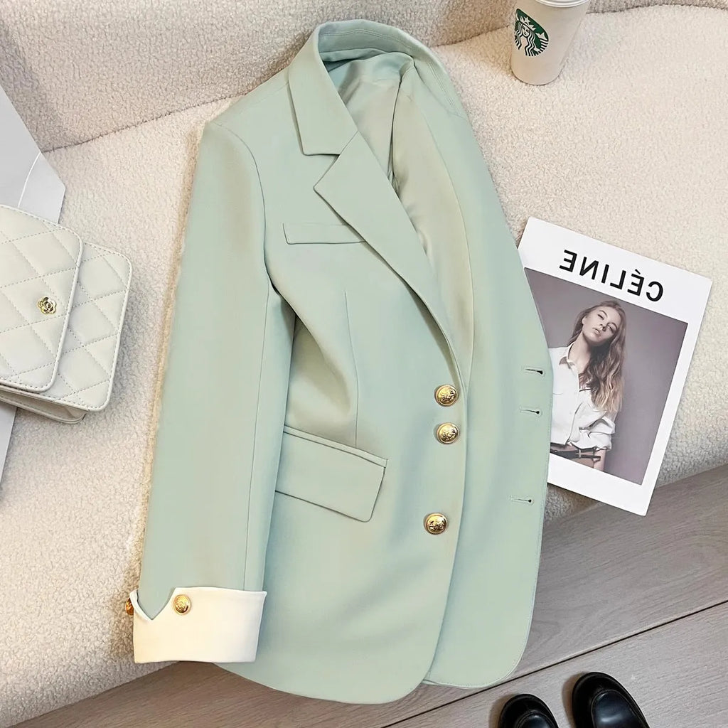 Korean-style women's coat in loose fit with pockets, available in Milky White or Black