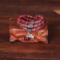 Handmade watermelon crystal Chinese knot bracelet with traditional geometric designs in 8mm and 6mm elephant style sizes