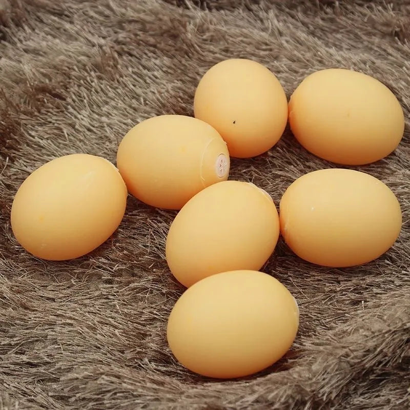 Simulation egg dog toy with light-up features and textured surface for tooth cleaning