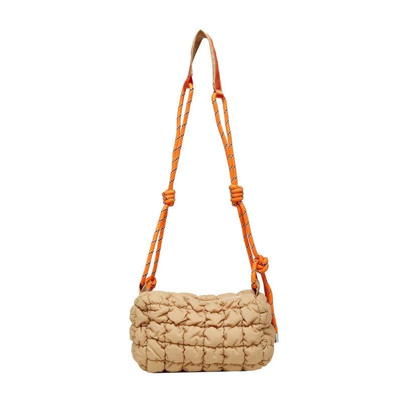 Women's lightweight nylon messenger bag in pillow shape with single shoulder strap