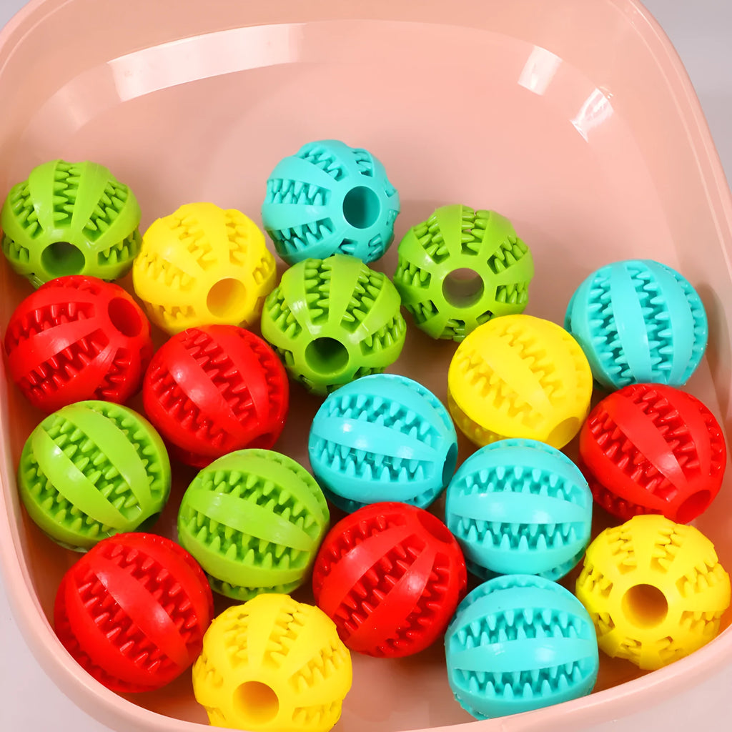 Rubber watermelon ball dog molar toy in green, 5cm diameter on white background
