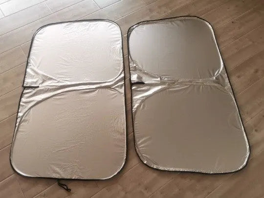 Titanium silver aluminium foil car sunshade shown in a rectangular shape for windshield protection.