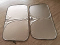 Titanium silver aluminium foil car sunshade shown in a rectangular shape for windshield protection.