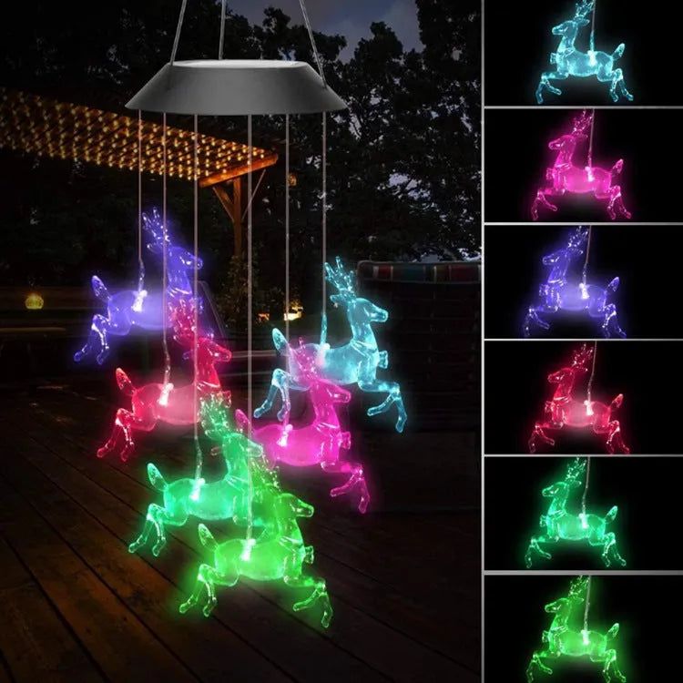 Solar-powered outdoor wind chime lamp with LED lights in hummingbird and butterfly designs for garden decoration.