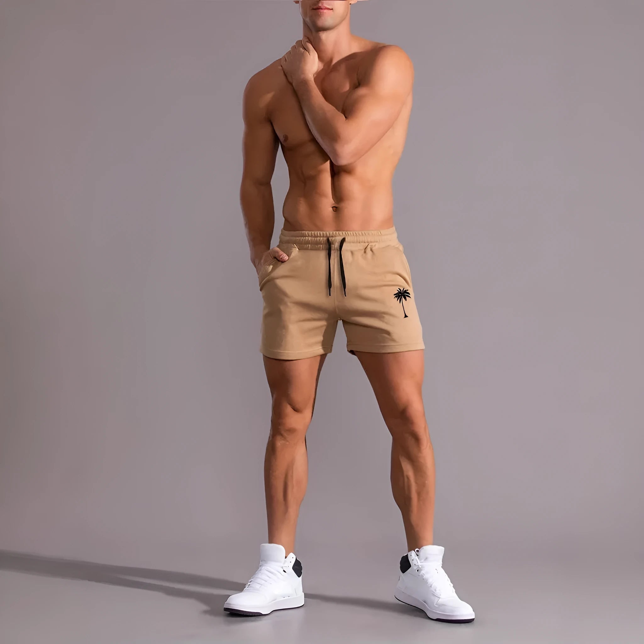 Men's khaki coconut print sports shorts with straight cut design and micro elastic fabric