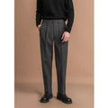 Men's straight-leg suit trousers in a draped fit, shown in a neutral colour.