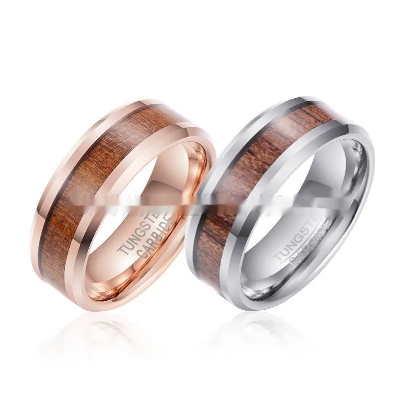 Men's 8mm wide U-shaped tungsten ring in rose gold finish on a hand.