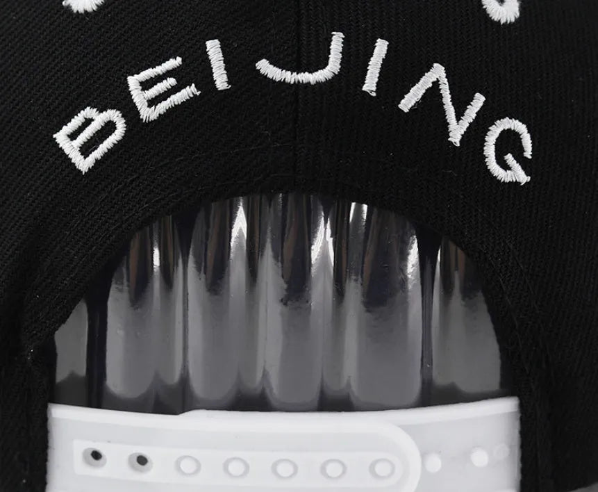 Cotton baseball cap with embroidered letter detail in adjustable size