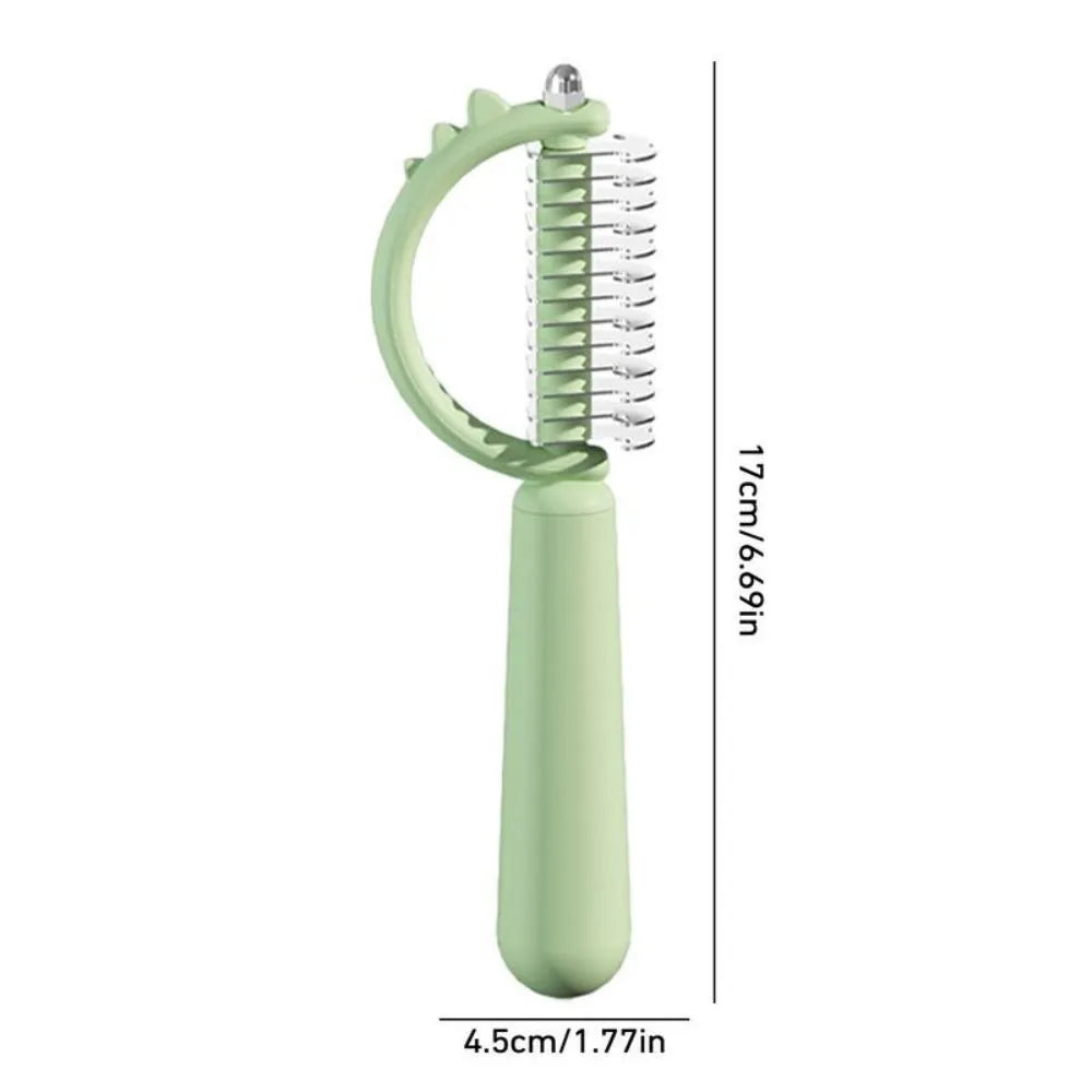 Blue dinosaur-shaped self-cleaning cat brush with double-sided stainless steel pins.
