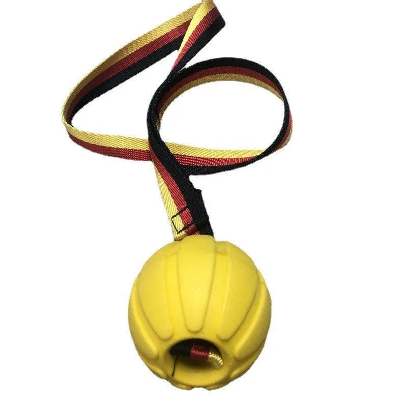 Floating EVA dog training ball with attached string in camouflage or yellow colour options