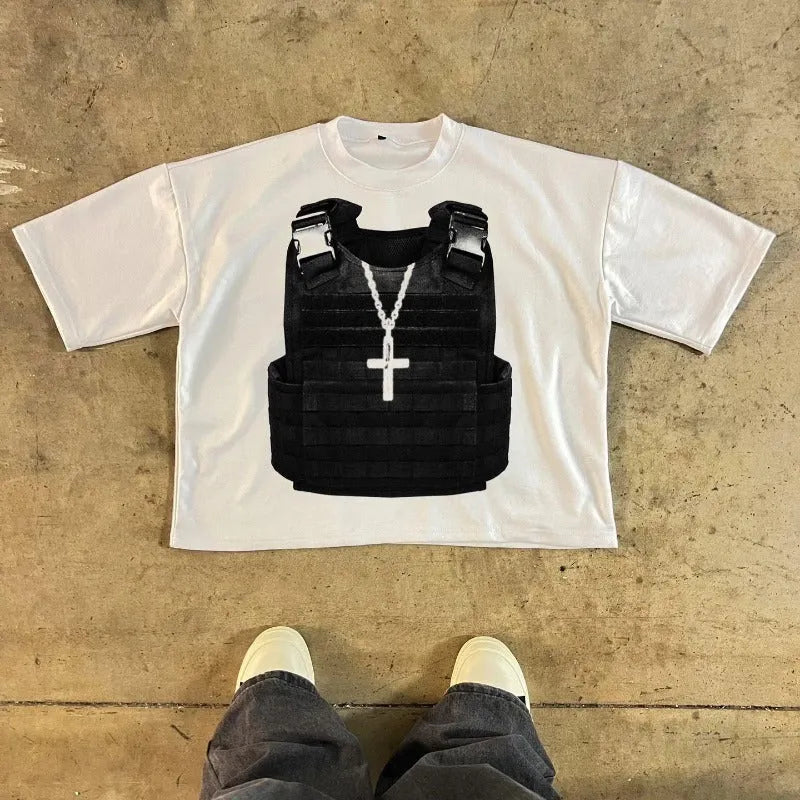 Man wearing a printed retro style cotton t-shirt with drop shoulder sleeves in a graphic design.