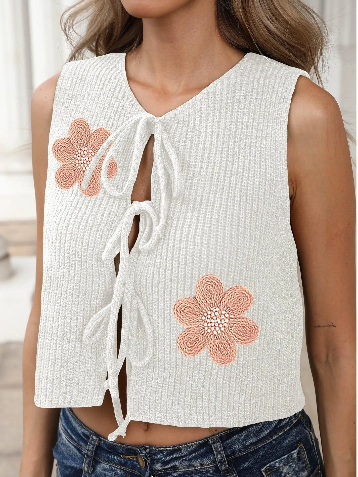 White ladies lace-up vest cardigan with bow front and floral pattern on deer plush fabric
