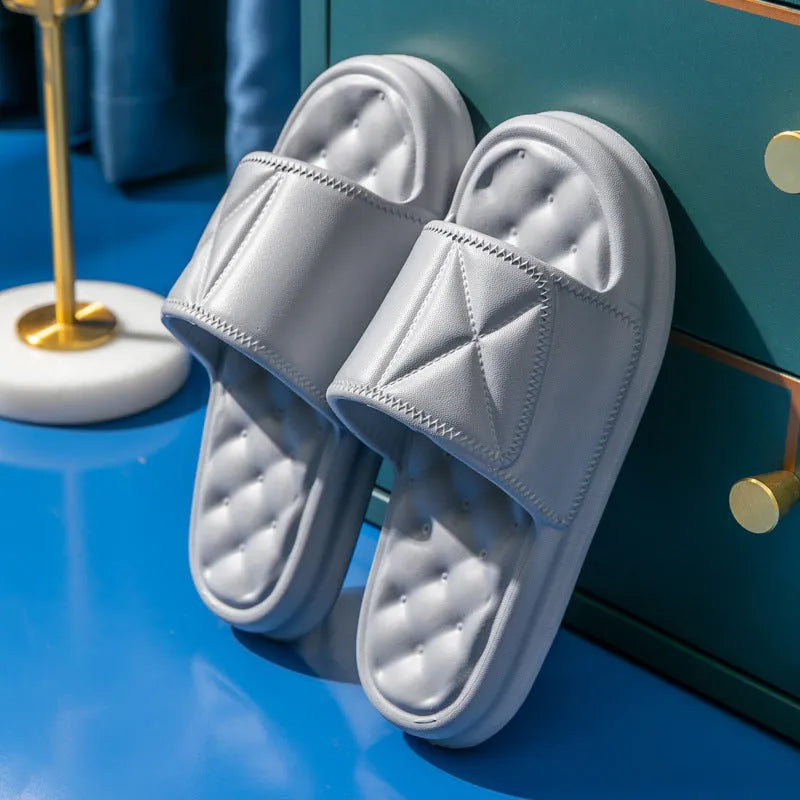 A pair of soft EVA bathroom slippers with a non-slip sole, shown in a selected colour.