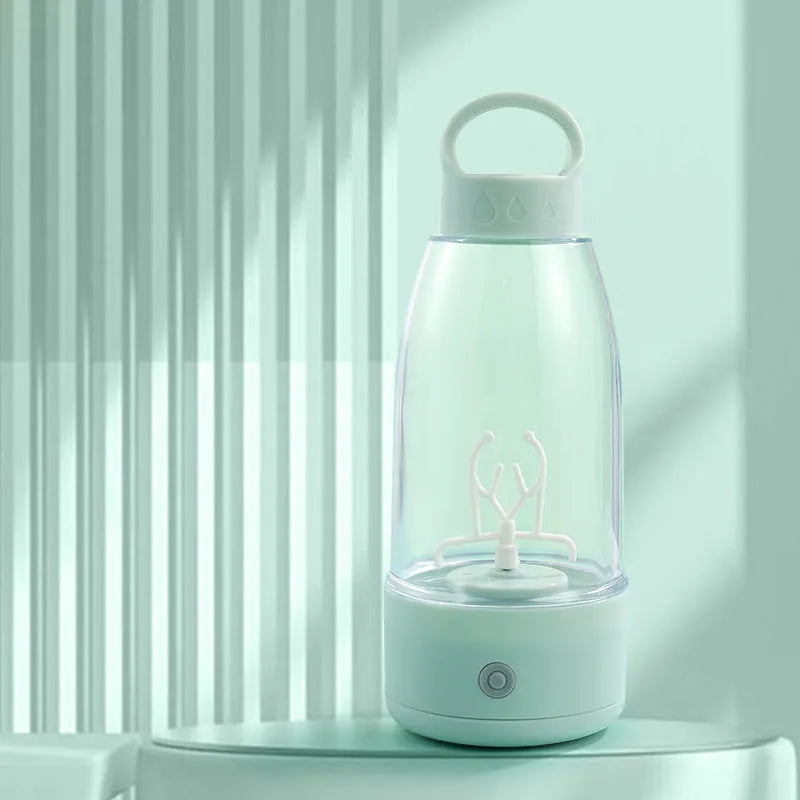 Automatic electric shaker bottle with USB port, handle, and blending motor in green, pink, or white colour.