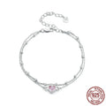 Sweet girlish 925 sterling silver bracelet with small heart-shaped pendant on an adjustable chain.