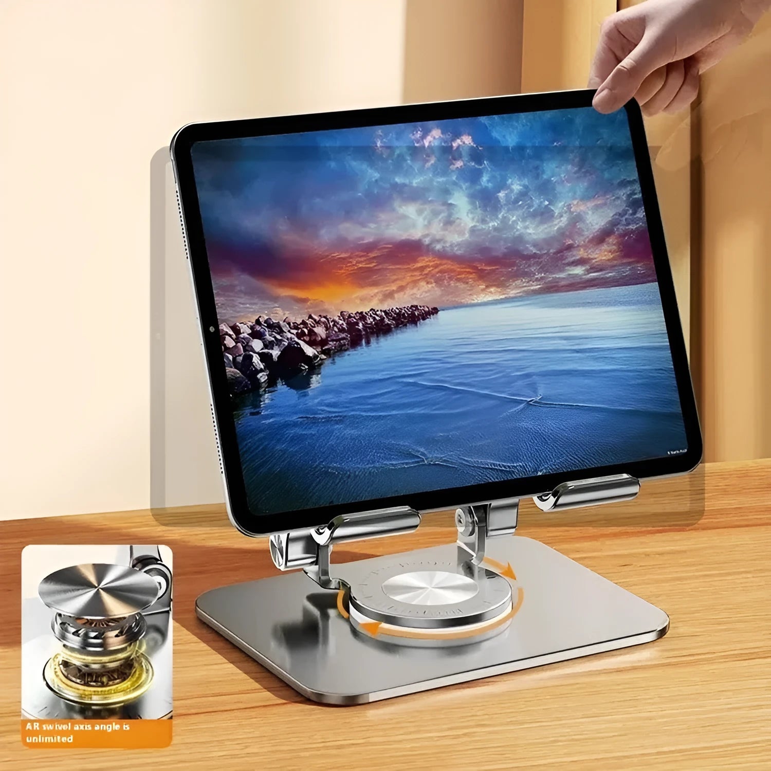 360-degree rotating aluminium alloy desktop folding tablet stand in silver on a desk