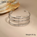 A geometric line design bracelet for women on wrist, shown in stainless steel with a simple opening clasp.