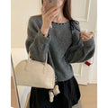 Women's loose-fitting grey knitwear pullover made from regenerated cellulose fibre