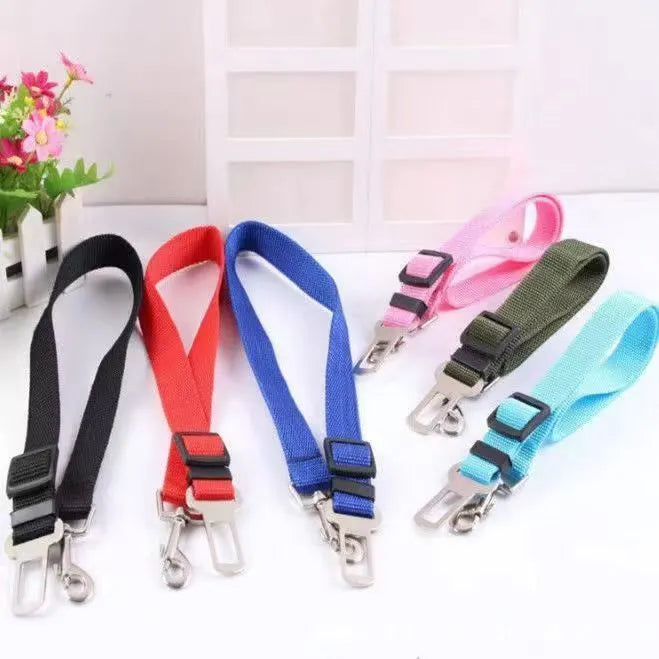 Black dog car seat belt with metal clip and adjustable polyester webbing on car seat